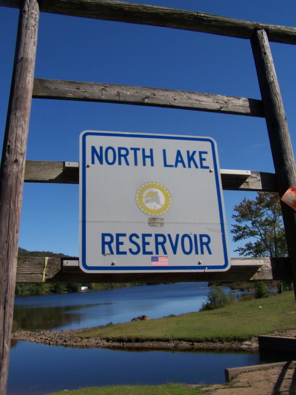 Photo: North Lake Reservoir Sign on a Blue Sky Day