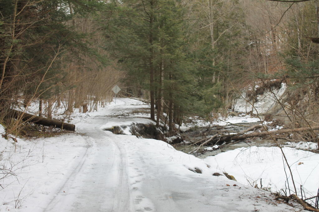Photo: More Erosion Past Washed Out Bridge