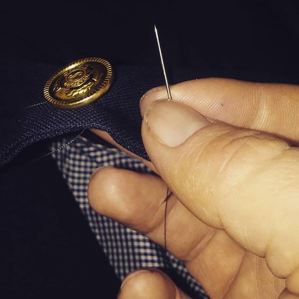 Photo: Sometimes you just have to sew back on your lost buttons Photo: Sometimes you just have to sew back on your lost buttons